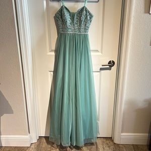 Beautiful teal colored sparkly prom/ wedding guest dress. Never worn, size 1.